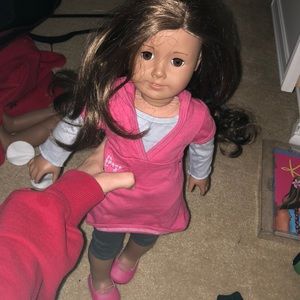 The doll with outfit look alike American girl